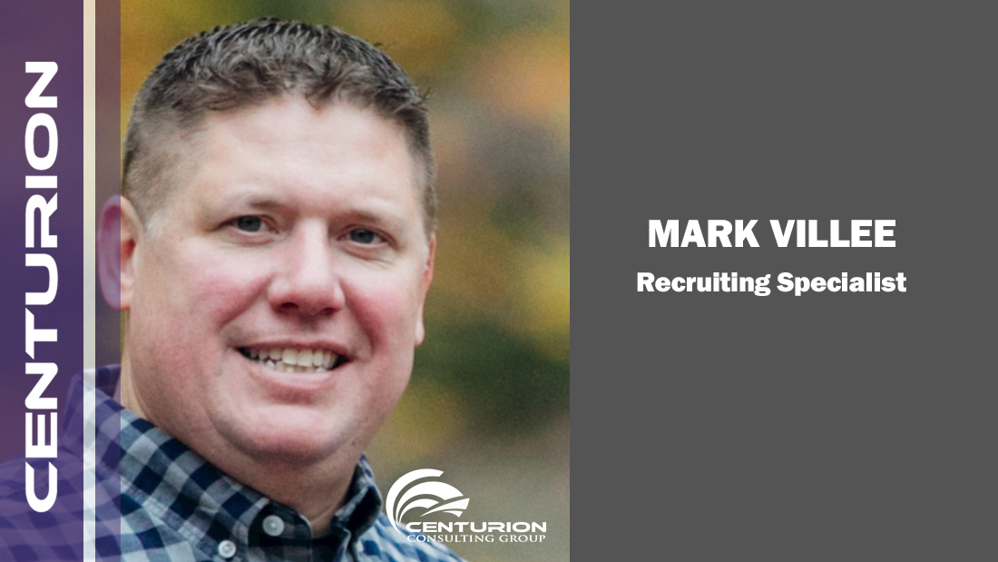 A man smiling for the camera with text that reads " mark wilson recruiting manager."