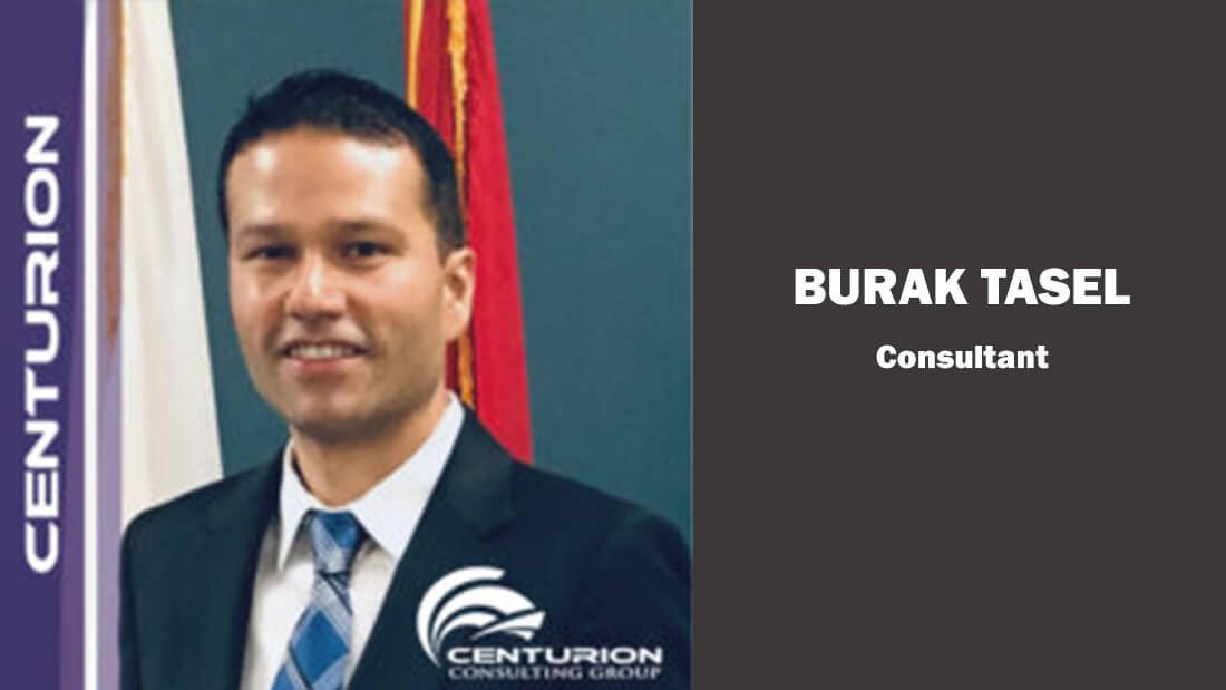 A man in suit and tie next to the words " burak "