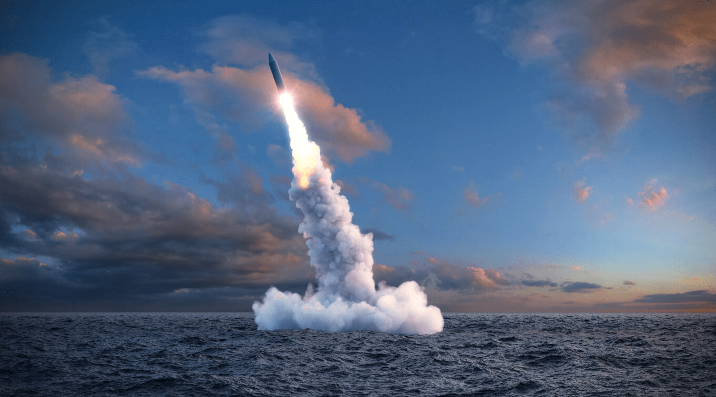A missile is being fired from the ocean.